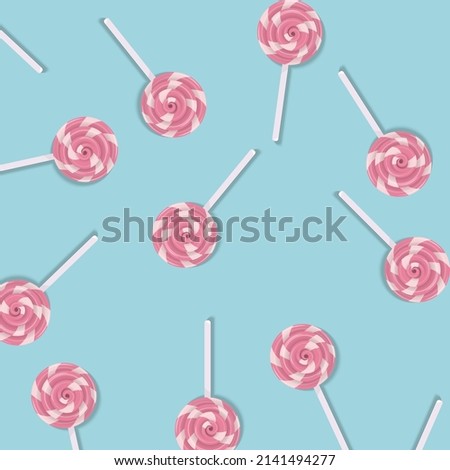 Pink candy pattern on blue background. Vector illustration