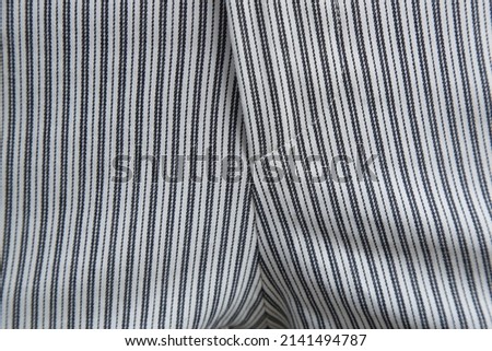 Close up image of striped fabric garment.