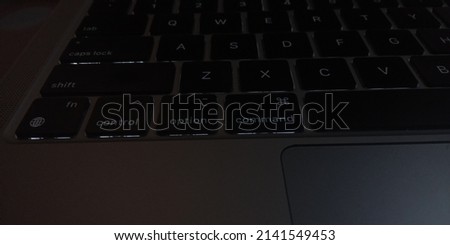 Focus on the keyboard of a laptop