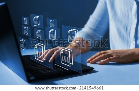 Online documentation database and document management system concept. Process automation to efficiently manage files. Royalty-Free Stock Photo #2141549661
