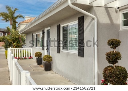 A rental property with a white picket fence.