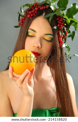 Young woman with berries in hair