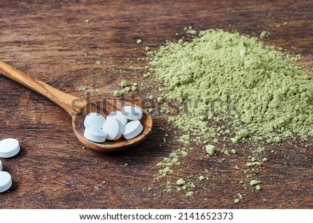 L-theanine, an amino acid pills made from matcha powder. Royalty-Free Stock Photo #2141652373
