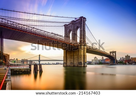 Brooklyn Bridge in New York City at dawn. Royalty-Free Stock Photo #214167403