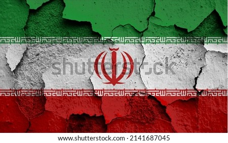 Flag of Iran on old grunge wall in background 