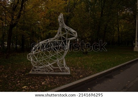 Photo of a polygonal sculpture of a rabbit in the VDNKh park in Moscow. Metal construction.