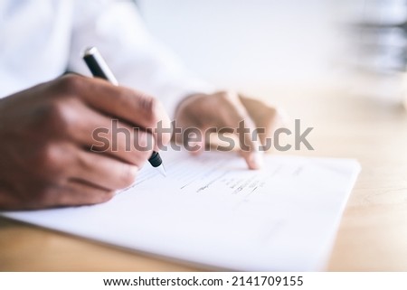 Should I sign here. Shot of a unrecognizable business person signing a document.