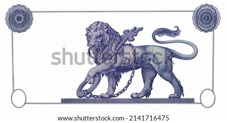Lion standing, with key and chain on white background in Money 1957. Royalty-Free Stock Photo #2141716475