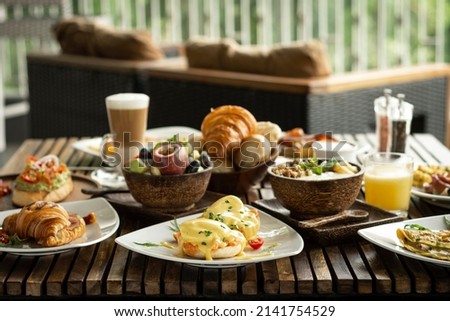 Western big gourmet breakfast selection mixed dishes on french restaurant table Royalty-Free Stock Photo #2141754529