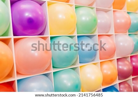 close up. shooting range with balloons. aero-shooting range. Popular and addictive game. Children will gladly compete in ability to accurately shoot at targets. entertainment for a children's holiday. Royalty-Free Stock Photo #2141756485