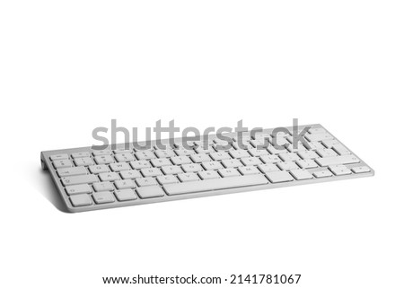 Computer keyboard on a colored background. Concept of typing, office work, remote work. Using your computer for work, play and online shopping.