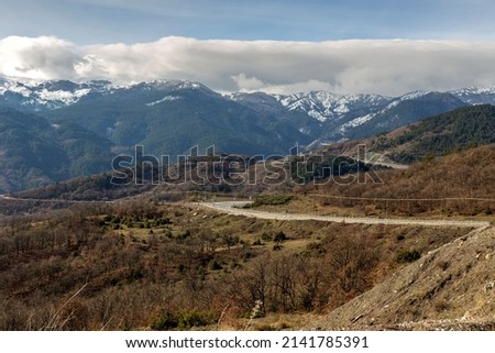 Scenic rural road in the mountains on a sunny, winter day (Greece)