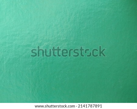 Shinny Green paper texture. Shiny greenish blue background with paper and metal texture. Royalty-Free Stock Photo #2141787891