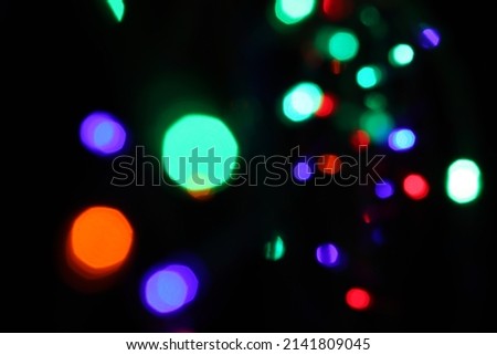 Nice picture, bokeh of multicolored light bulbs. For making illustrations or backgrounds of various festivals. 