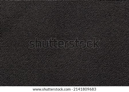 Black fabric cloth polyester texture and textile background. Royalty-Free Stock Photo #2141809683