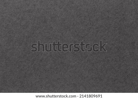 Gray colored eco-recycled kraft paper sheet texture was used to create the background.
