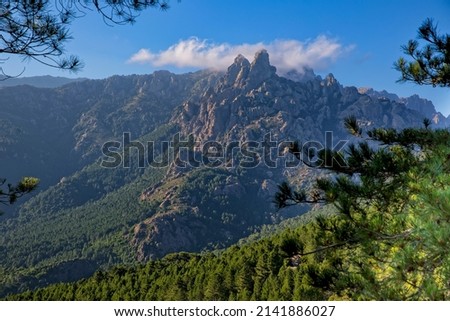 In the south of Corsica, the Aiguilles de Bavella tower into the sky. The Col de Bavella is a mountain pass in the south of Corsica Regional Nature Park, Corsica island, France
