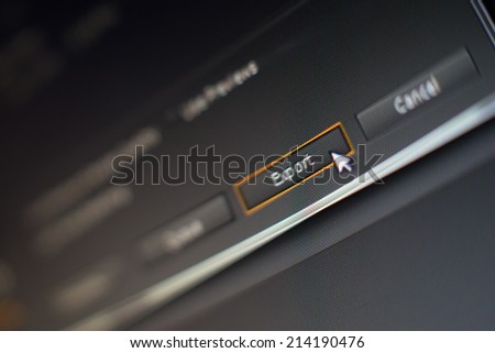 Mouse pointer clicking on a export button in editing software, macro shot