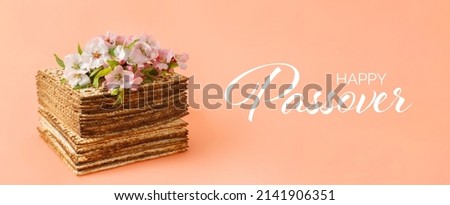 Matzo in the form of a cake, decorated with almond flowers. Pesach celebration concept (jewish Passover holiday) Royalty-Free Stock Photo #2141906351