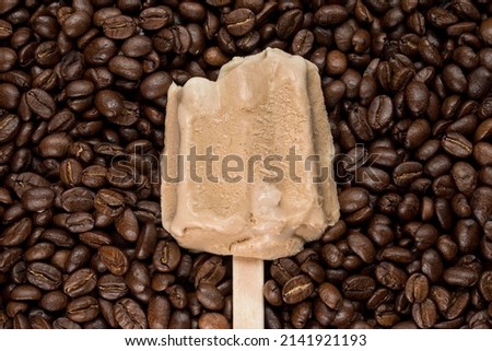 Coffee ice cream on some coffee beans