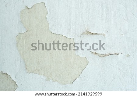 cement background with peeling paint                         