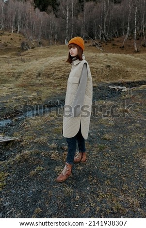 tourist in the autumn forest walk fresh air travel landscape