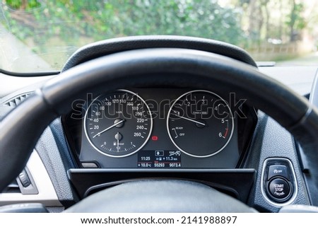 Car speedometer panel. Speedometer of a modern vehicle. Close-up image of car speed dashboard. Modern car interior details