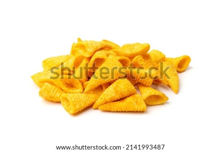 Corn cone pile isolated. Bugles chips, puffs with spices, crunchy puffed snacks, salty corn cones Royalty-Free Stock Photo #2141993487