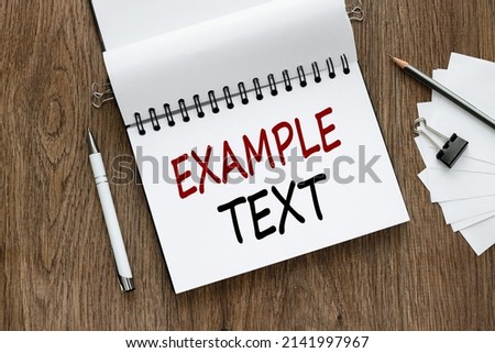 example text. open notepad with text near white stickers