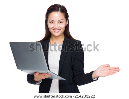 Businesswoman with laptop present