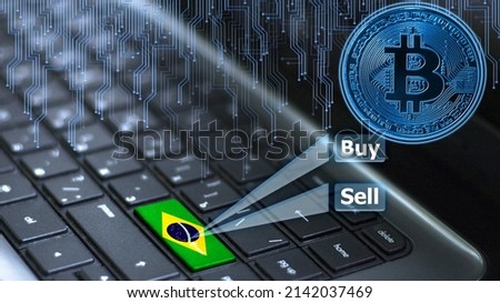 Keyboard with Brazil flag on enter button with bitcoin coin hologram and online buy and sell concept. Royalty-Free Stock Photo #2142037469
