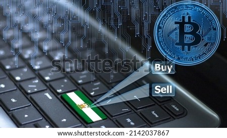 Keyboard with Andalusia flag on enter button with bitcoin coin hologram and online buy and sell concept.