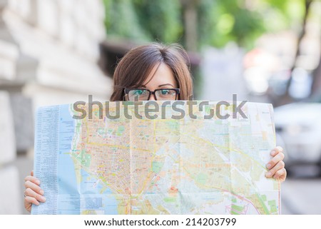 Girl tourist with map