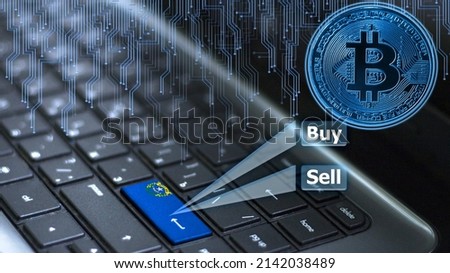 Keyboard with State of Nevada flag on enter button with bitcoin coin hologram and online buy and sell concept.