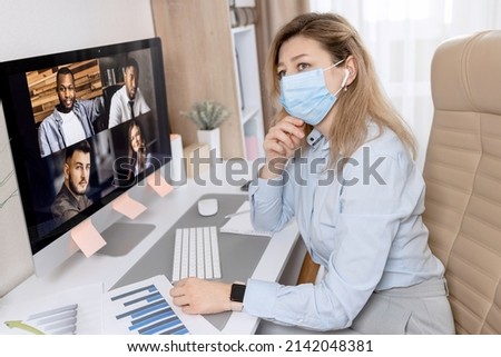 Close up of successful business woman holds a conference from home, speaks on the modern phone, discusses a successful project with colleagues online. Distant work concept. High quality photo