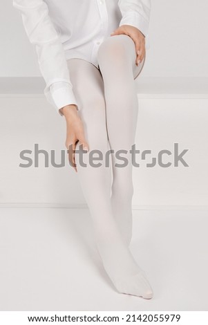 Anti-embolic Compression Hosiery for surgery isolated on white. Medical white stockings, tights for varicose veins and venouse therapy. Thrombo embolic deterrent hose or anti-embolism stockings.