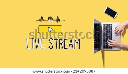 Live stream with person working with a laptop