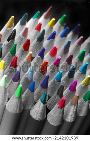                   pencils black and white with colorful tips             