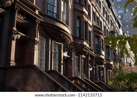 Row of Beautiful Old Brownstone Homes on the Upper West Side of New York City Royalty-Free Stock Photo #2142110715