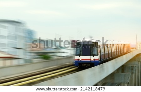 BTS Skytrain is running into the Bangkok platform. It is the most important and fastest public transportation system in Thailand. Royalty-Free Stock Photo #2142118479