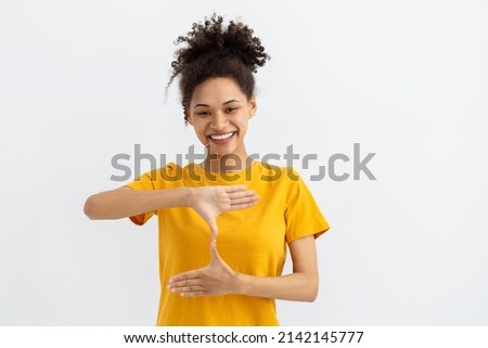 Deaf mute young African American woman on white background Royalty-Free Stock Photo #2142145777