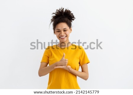 Deaf mute young African American woman on white background