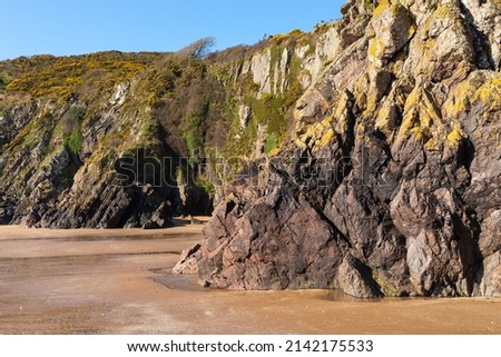 Cliff walls on the Scottish coast.  Sandyhills Beach, Dalbeattie, Scotland.