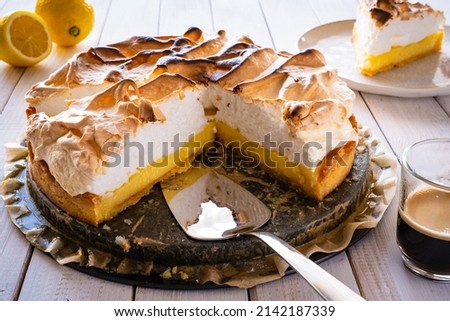 Lemon tart on wooden table 