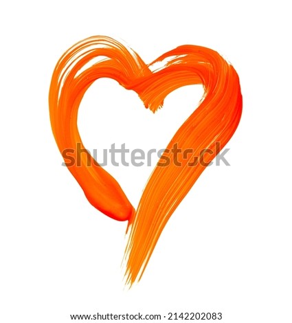 Heart Shape made of orange yellow paint with brush.