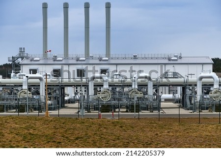 Lubmin, Mecklenburg-West Pomerania  Germany - April-3-2022: Gas pipes, connections, equipment and pressure reducers at the site of Gazprom's Nord Stream 2 Pipeline Landing in Germany, Western Europe. Royalty-Free Stock Photo #2142205379