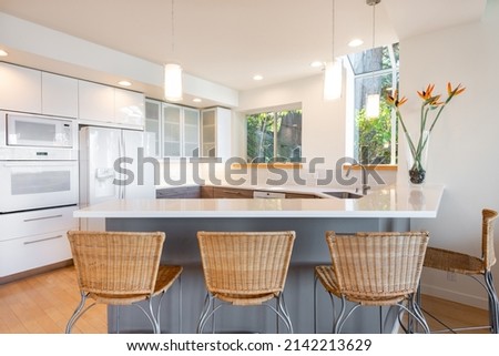 Scandanavian style home interiors living room kitchen bedroom and foyer front entry Royalty-Free Stock Photo #2142213629