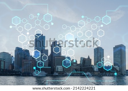 Panoramic picturesque city view of Boston Harbour at day time, Massachusetts. Building exteriors of financial downtown. Technological, educational center. Blockchain and cryptography concept, hologram
