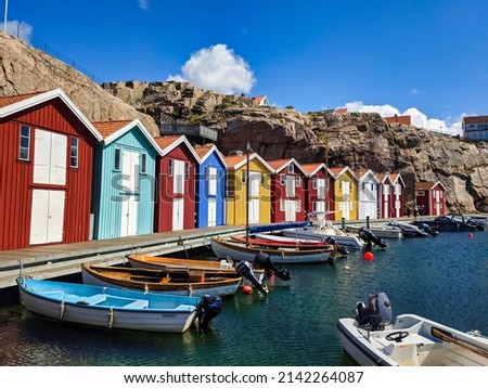beautiful colored houses in the fishing village of Smogen. Swedish culture with colored houses in the small boat harbors Royalty-Free Stock Photo #2142264087