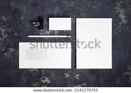 Blank stationery set on concrete background. Template for branding identity. For graphic designers presentations and portfolios. Flat lay.